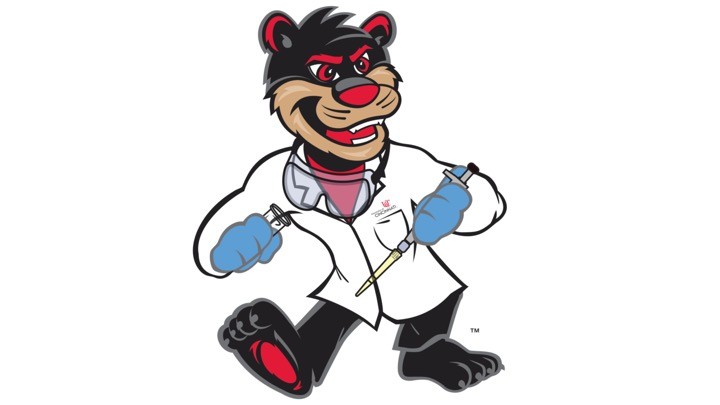 UC Research Bearcat mascot wearing a lab coat and holding scientific tools